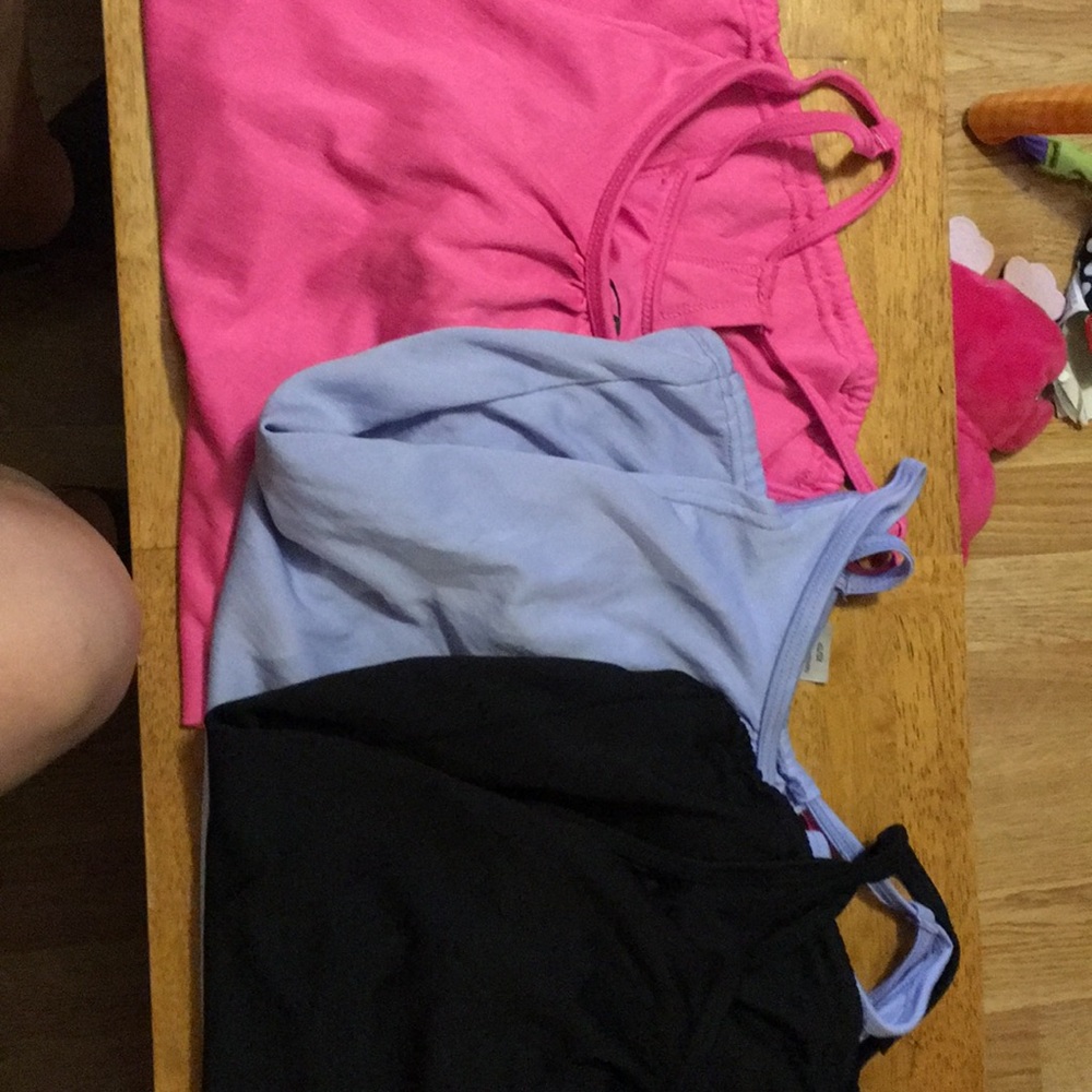 Three champion shirts